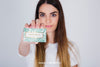 Mockup Concept Of Young Woman Presenting Business Card Psd
