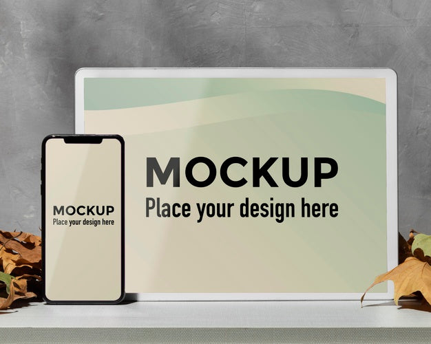 Mockup Devices Standing On The Table Next To Leaves Psd