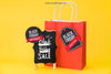 Mockup For Black Friday With Bag And Labels Psd