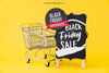 Mockup For Black Friday With Cart And Board Psd