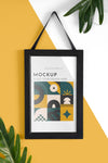 Mockup Frame On Wall With Leaves Psd