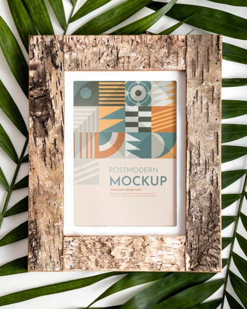 Mockup Frame On Wall With Leaves Psd