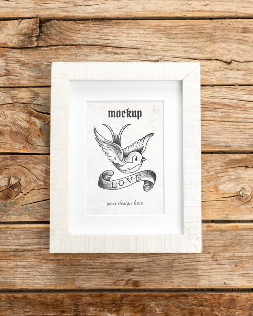 Mockup Frame On Wooden Table Psd