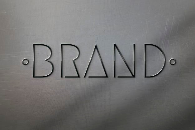 Mockup Of 3D Metallic Logo On Scratched Metallic Surface Psd