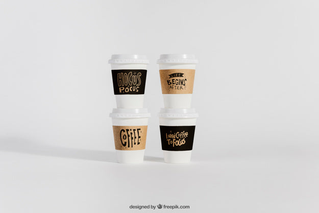 Mockup Of Four Take Away Coffee Cups Psd