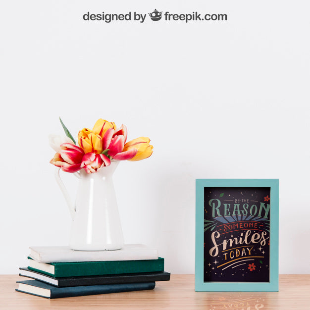 Mockup Of Frame And Plant On Books Psd
