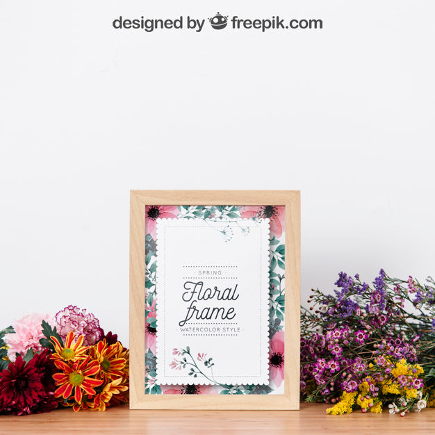 Mockup Of Frame Between Beautiful Flowers Psd