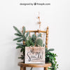 Mockup Of Frame On Chair With Flowers And Cactus Psd