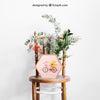 Mockup Of Frame On Chair With Flowers Psd