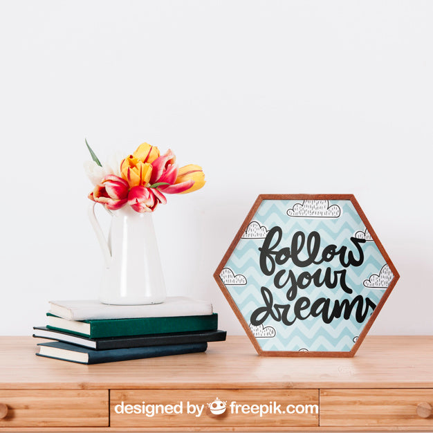 Mockup Of Hexagonal Frame Next To Books Psd