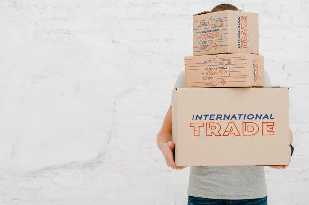 Mockup Of Man With Cardboard Boxes Psd