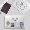Mockup Of Newspaper With Notebook And Photo Book Psd
