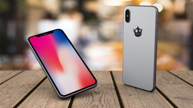 Mockup Of Smartphones On Tabletop Psd