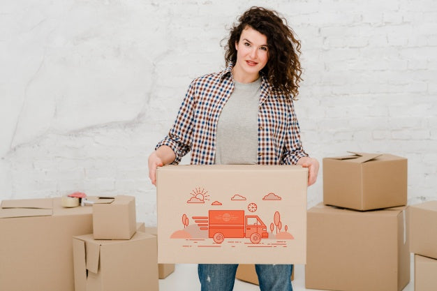 Mockup Of Woman With Cardboard Boxes Psd