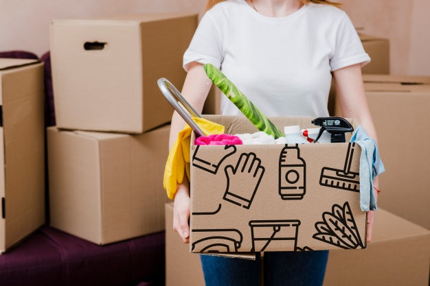Mockup Of Woman With Cardboard Boxes Psd