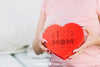 Mothers Day Mockup With Woman Holding Heart Psd