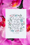 Motivational Message On Card Beside Flowers Psd