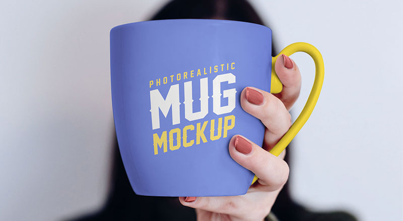 Mug In Female Hand Mockup Psd