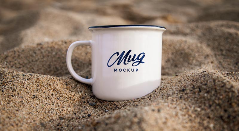 Mug In Sand Mockup Psd