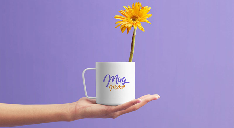 Mug On Female Hand Mockup Psd