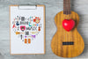 Music Mockup With Guitar And Clipboard Psd