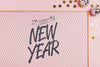 New Year Lettering With Simple Frame On Pink Background Psd