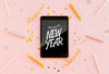 New Year Minimalist Lettering On Black Tablet Psd