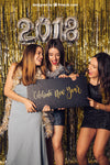 New Year Mockup With Three Girls Holding Small Board Psd