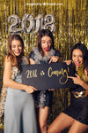 New Year Mockup With Three Girls Pointing At Black Board Psd