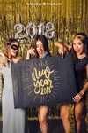 New Year Mockup With Three Girls Pointing At Board Psd