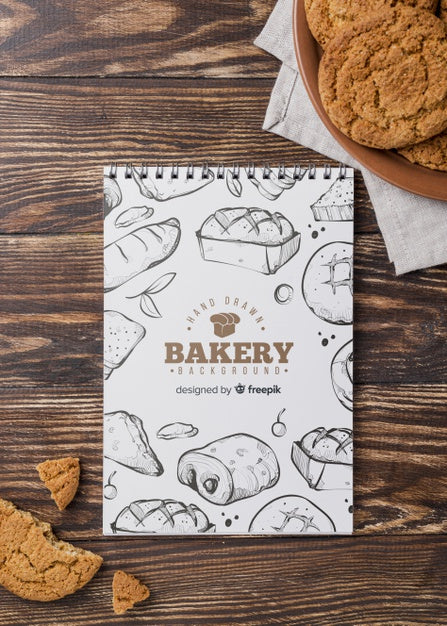 Notebook And Biscuits On Table Psd