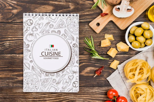 Notebook And Italian Food Arrangement Psd