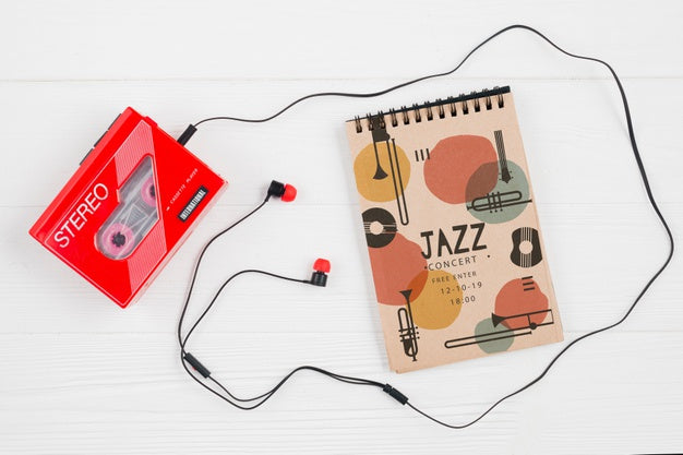 Notebook Beside Music Cassette Psd