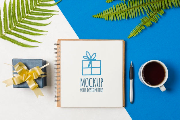 Notebook Mock-Up Next To Birthday Gift Psd