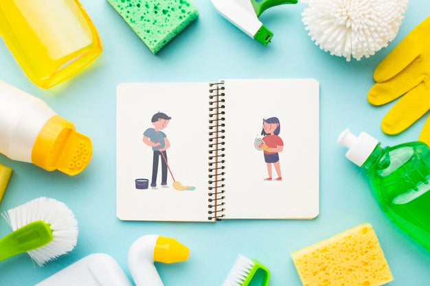 Notebook Mock-Up Surrounded By Cleaning Tools Psd