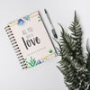 Notebook Mockup Next To Leaves Psd