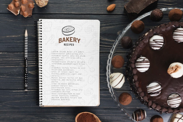 Notebook Mockup With Delicious Pastry Psd