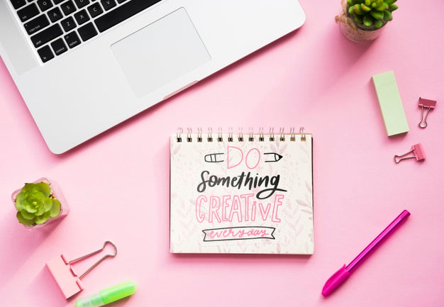 Notebook On Desk With Positive Message Psd