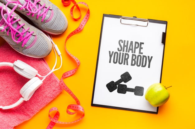 Notebook With Fitness Message And Equipment Psd