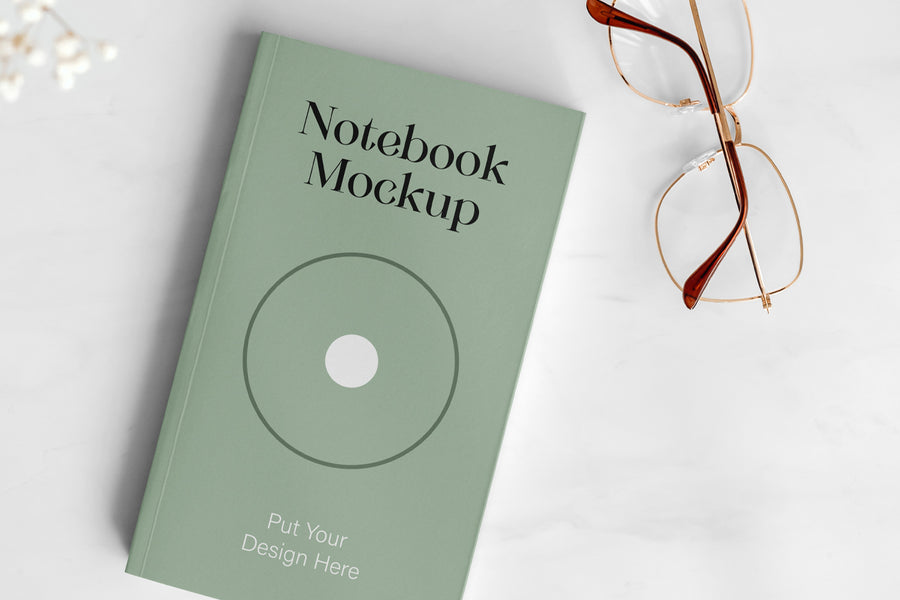 Notebook With Glasses Mockup