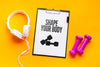 Notebook With Message And Headphones Psd