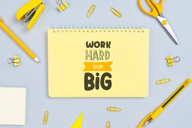 Notebook With Positive Message And Office Tools Beside Psd