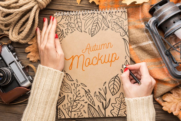 Notebook With Rope, Camera And Lantern Psd