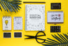 Notebooks Leaves And Scissors On Yellow Desk Psd