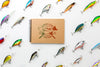 Notepad Mock-Up Surrounded By Fish Bait Psd