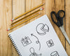 Notepad Mockup Next To Pencils And Sissors Psd