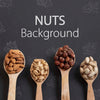 Nuts Assortment In Wooden Spoons Psd
