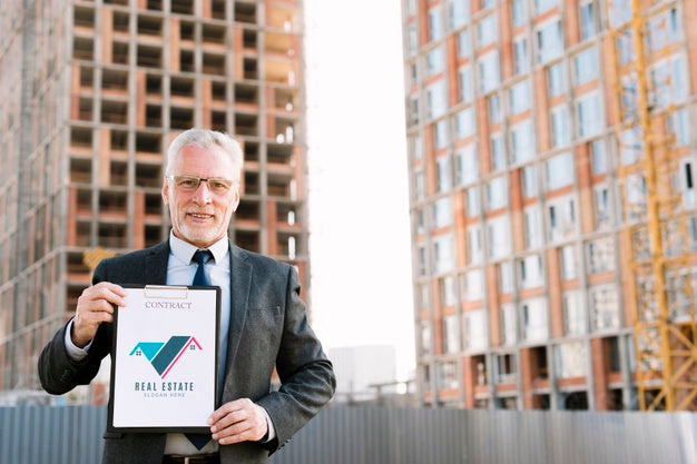 Old Architect Holding A Clipboard Mock-Up Psd