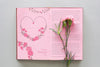Open Book Mockup With Flower For Valentine Psd