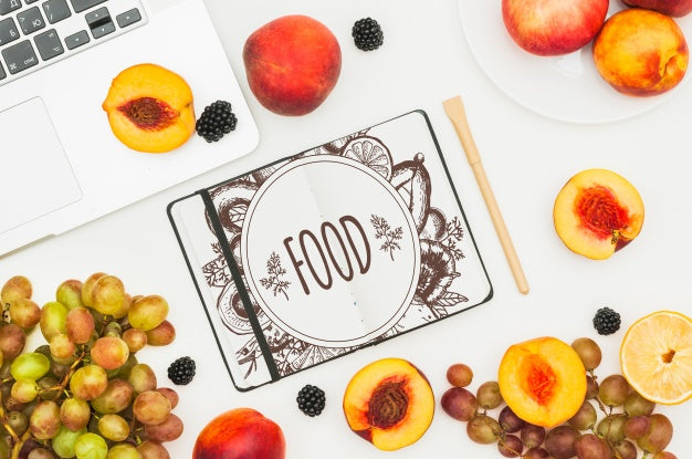 Open Book Mockup With Fruits Psd
